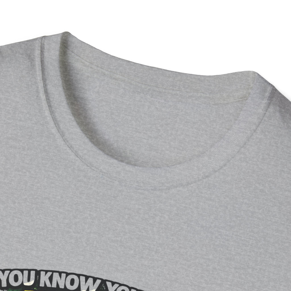 Funny Golf T-Shirt — "You Know You Suck at Golf When You Yell Fore While Putting"