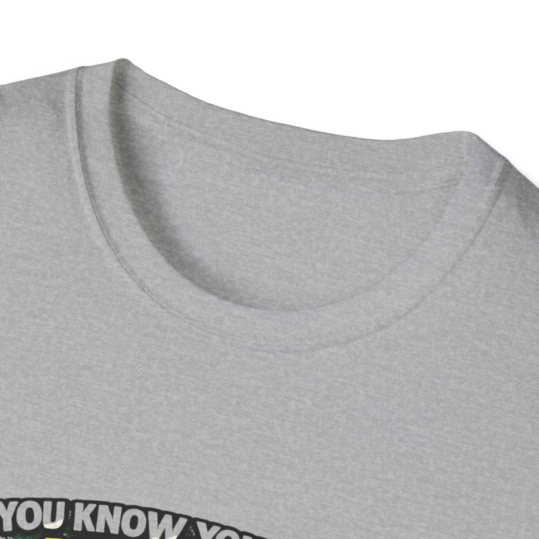 Funny Golf T-Shirt — "You Know You Suck at Golf When You Yell Fore While Putting"