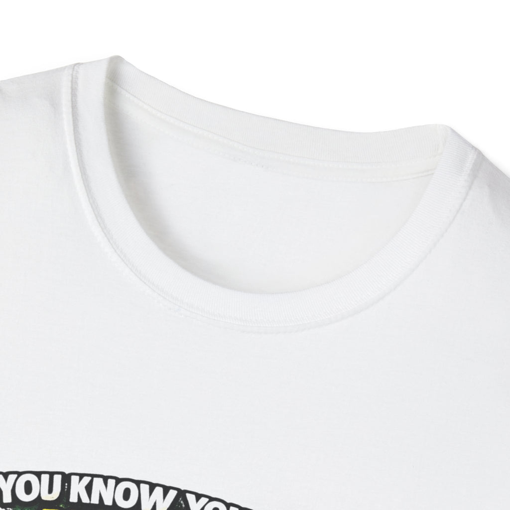 Funny Golf T-Shirt — "You Know You Suck at Golf When You Yell Fore While Putting"